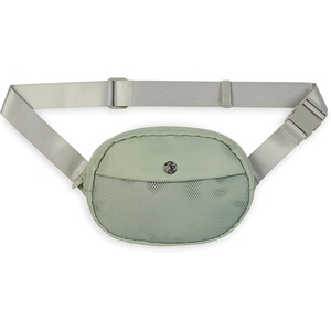 image:imageGaiam Go for It Waist Pack Adjustable Fanny Pack Crossbody Bags for Women amp Men  Waterproof Cross Body Bag with Zippered Pockets Running Belt Bag Ideal for Vacation amp TravelCelery