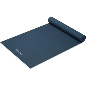 image:imageGaiam Yoga Mat  Premium 5mm Solid Thick Non Slip Exercise amp Fitness Mat for All Types of Yoga Pilates amp Floor Workouts 68 x 24 x 5mm  Premium nonslip mat in solid colors Cushioned support for yoga Pilates amp floor workouts at home or studioMarine
