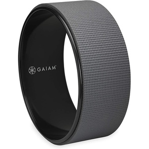 image:imageGaiam Yoga Wheel  MultiPurpose Yoga Prop amp Back Stretcher  Assists with Flexibility Releasing Tension in Back Chest and Spine  Textured NonSlip Surface Durable Core  5W x 12 Diameter