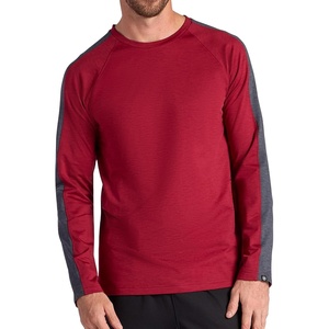 image:imageGaiam Mens Power Long Sleeve Crewneck Raglan Top Standard Fit Stretch Midweight MaterialGarnet HeatherEbony Heather